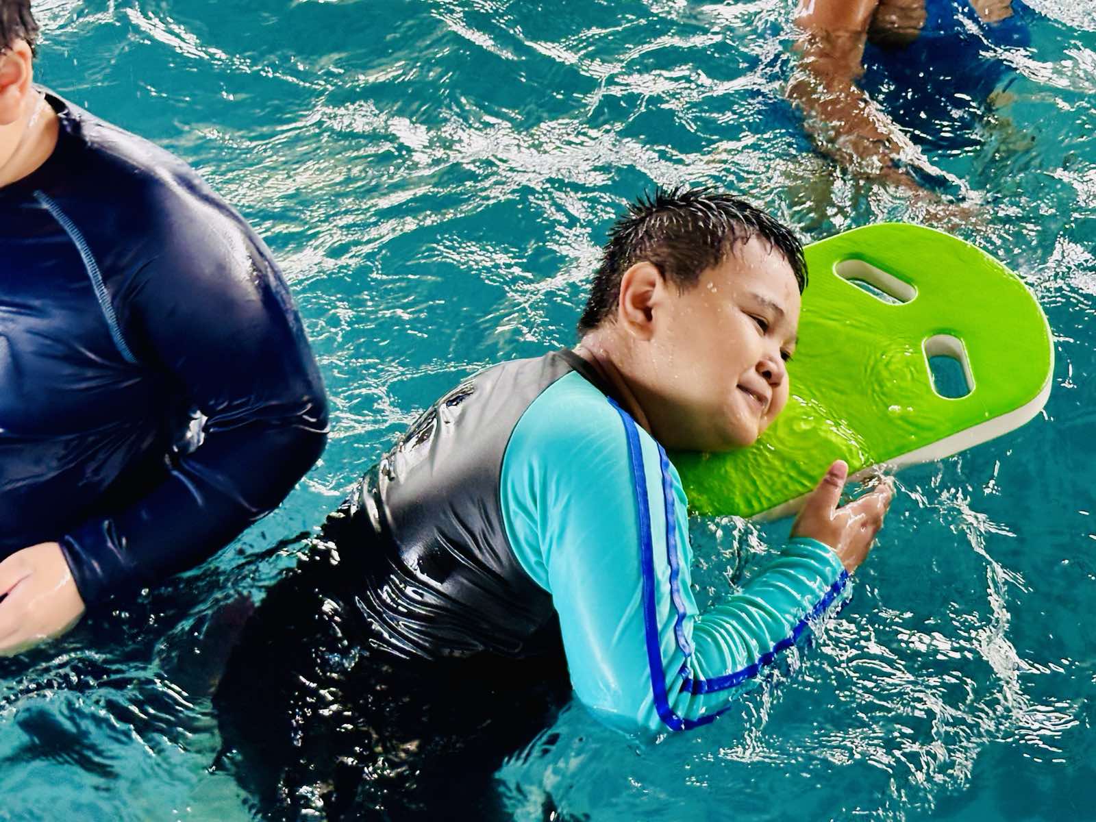 Children swimming in aquatic therapy pool