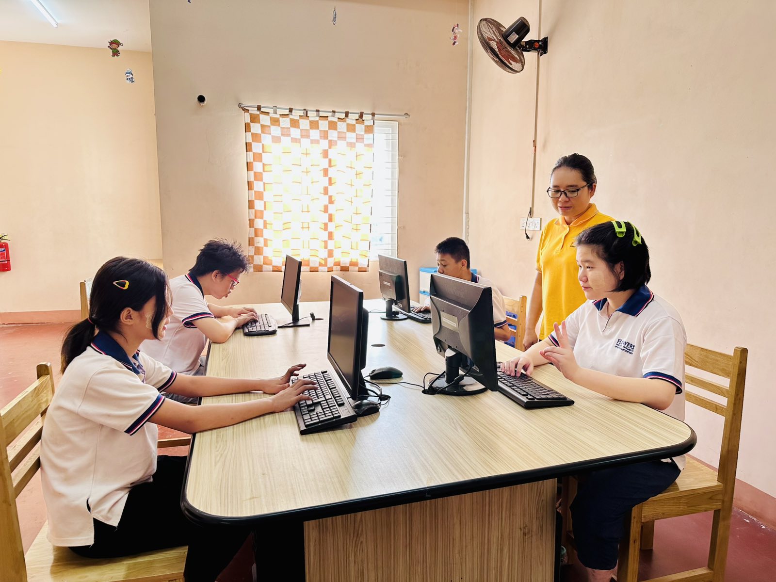 Children learning with computers